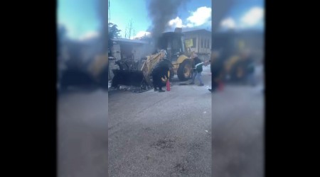 �� makinesinde ��kan yang�n� karla s�nd�rmeye �al��t�lar